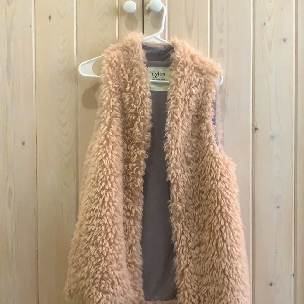 Cozy, fluffy long pink vest